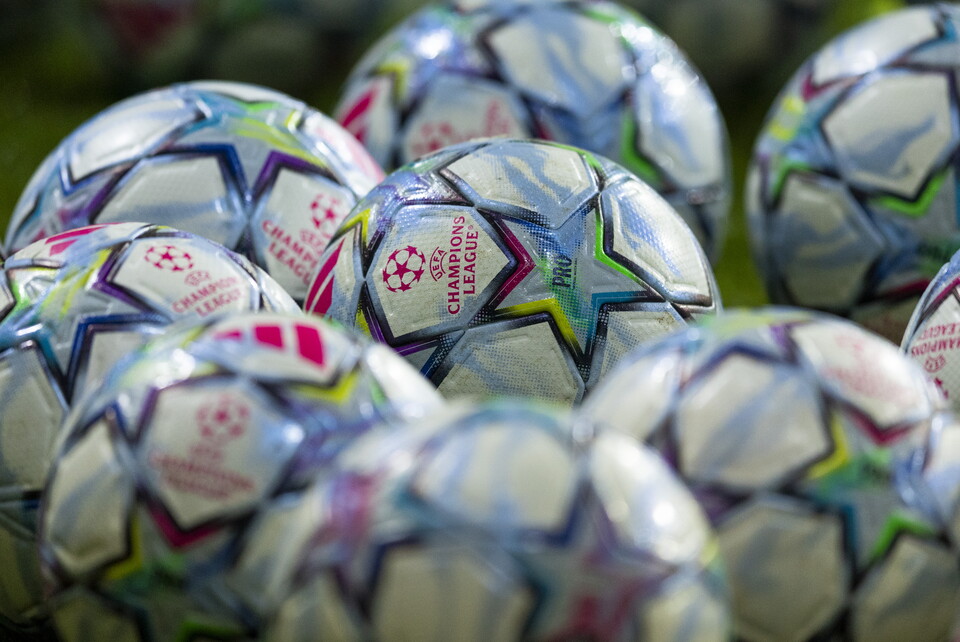 Many footballs with designs on them
