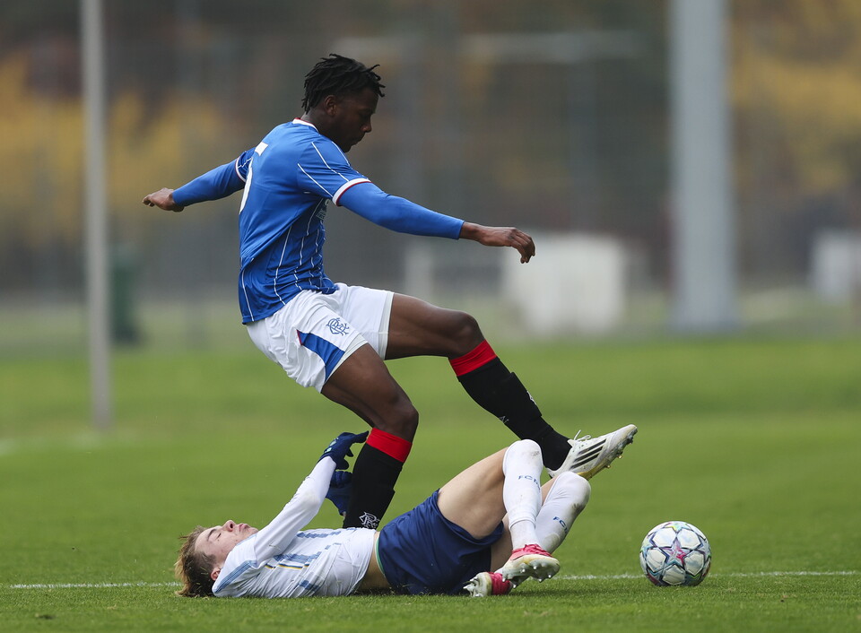 Corey Ngwenya challenges for the ball