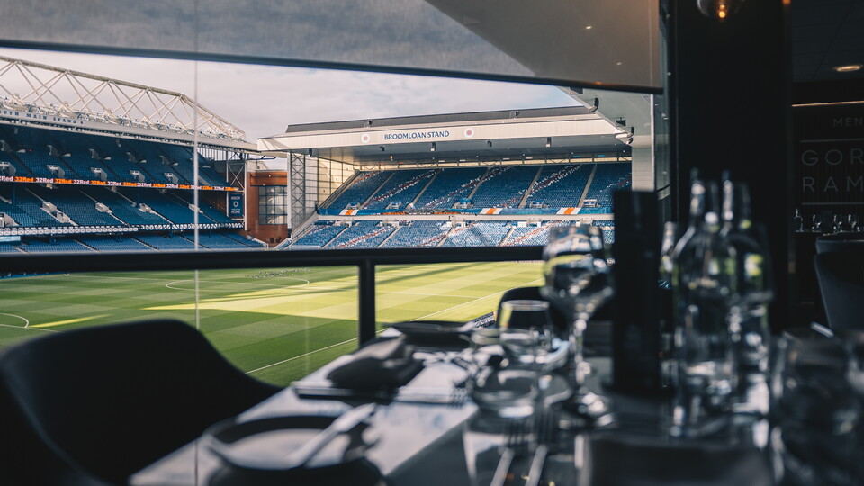 Menu By Gordon Ramsay lounge looking over the pitch at Ibrox Stadium