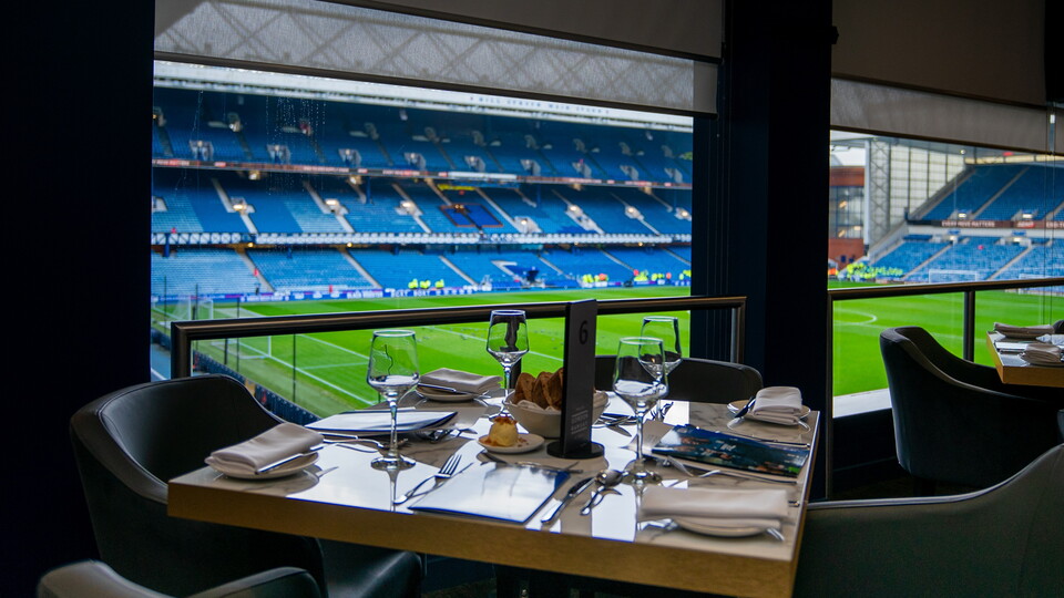 Menu By Gordon Ramsay lounge looking over the pitch at Ibrox Stadium