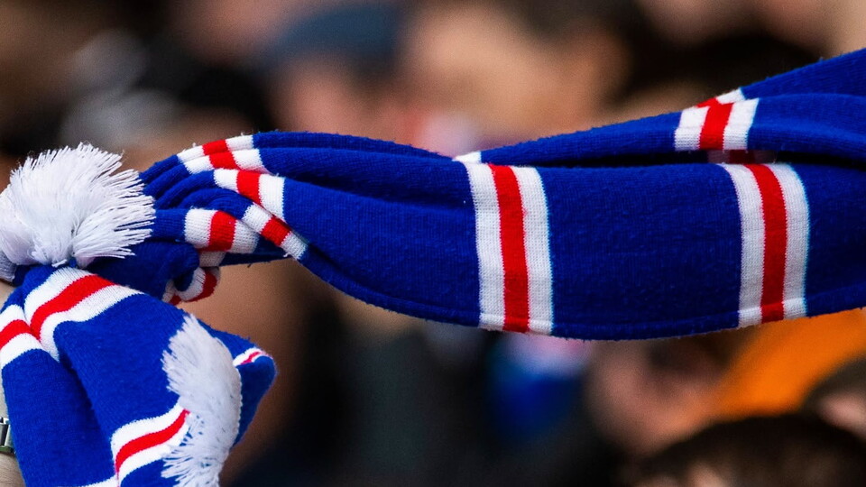 Rangers fan with Rangers scarf