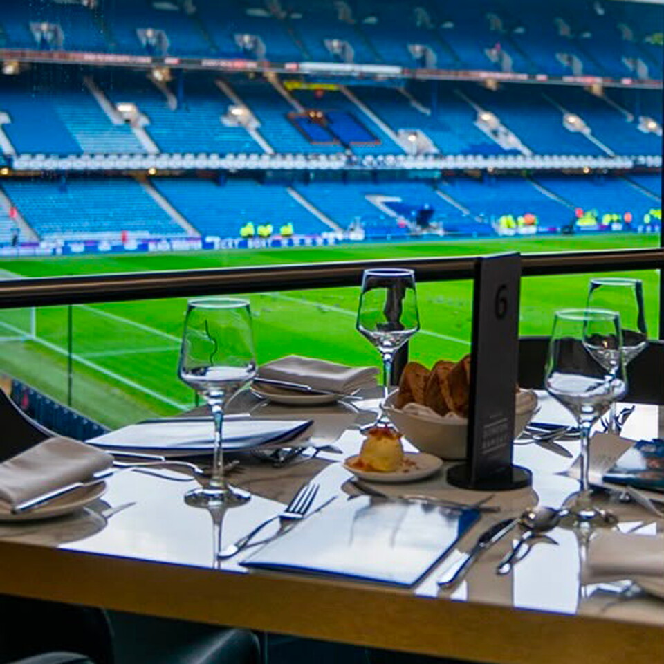 Menu By Gordon Ramsay lounge looking over the pitch at Ibrox Stadium